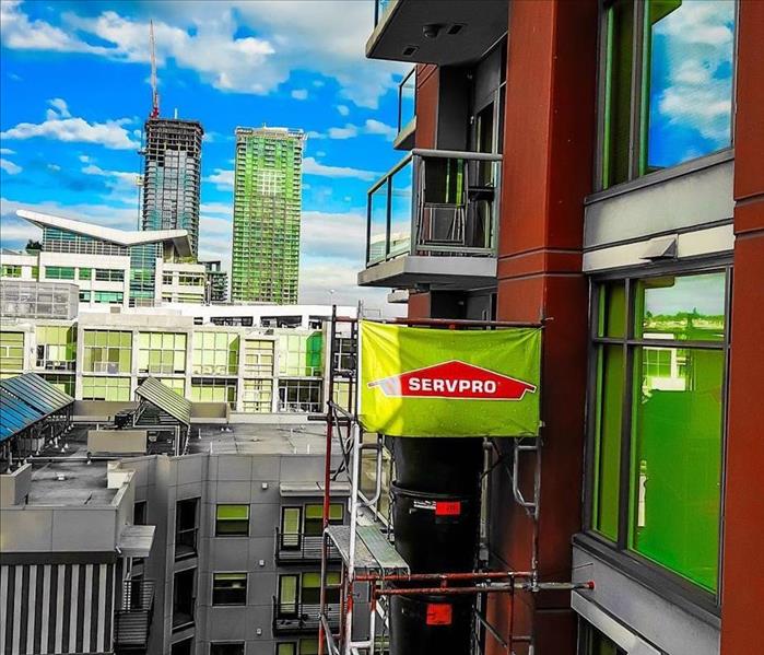 SERVPRO flag displayed on a building.