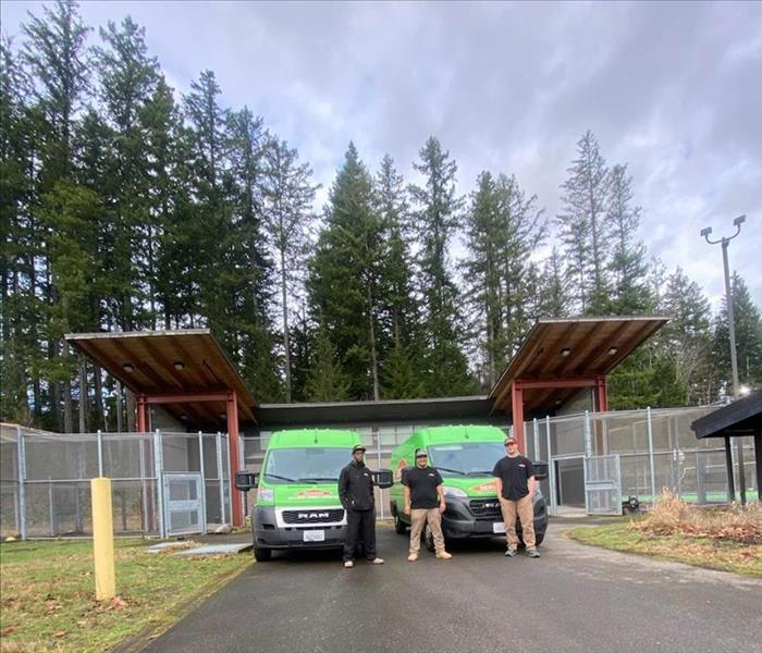 A few of our team members in front of our SERVPRO® branded van in Seattle, WA